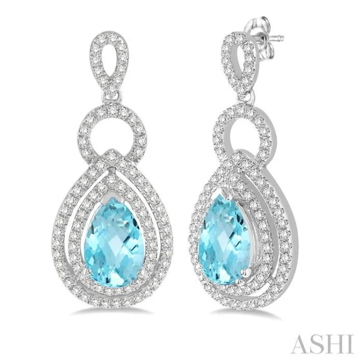 Women’s personalized earrings-8x5mm Pear Shape Aquamarine and 1/2 Ctw Round Cut Diamond Earrings in 14K White Gold