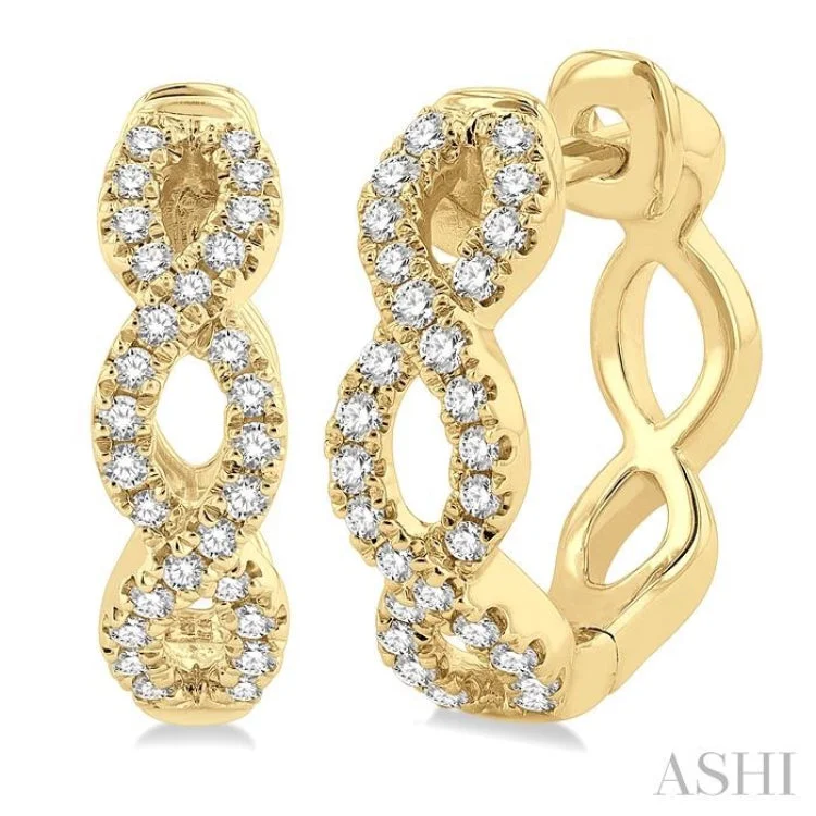 Women’s hoop silver earrings-1/4 ctw Petite Twisted Round Cut Diamond Fashion Huggies in 10K Yellow Gold