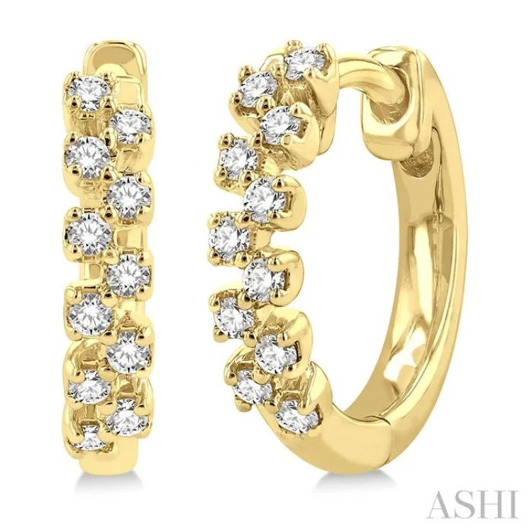 Women’s gold earrings-1/5 ctw Petite Zigzag Layout Round Cut Diamond Fashion Huggies in 10K Yellow Gold