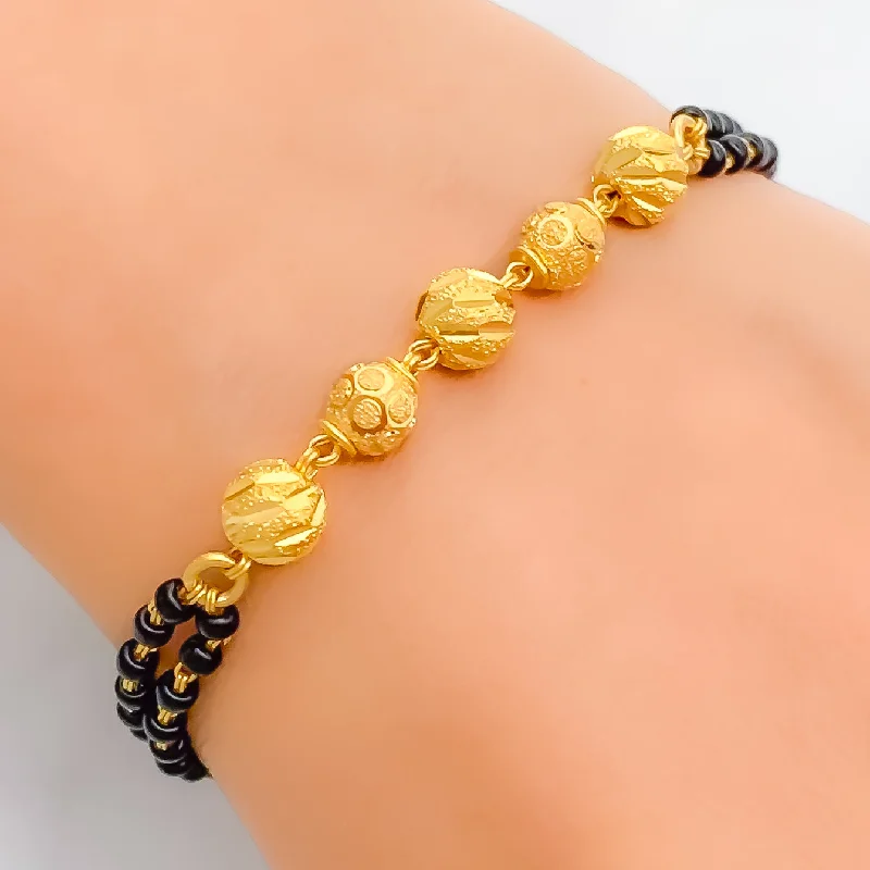 Women’s diamond bracelets for special occasions-Charming Dressy 22k Gold Black Bead Bracelet