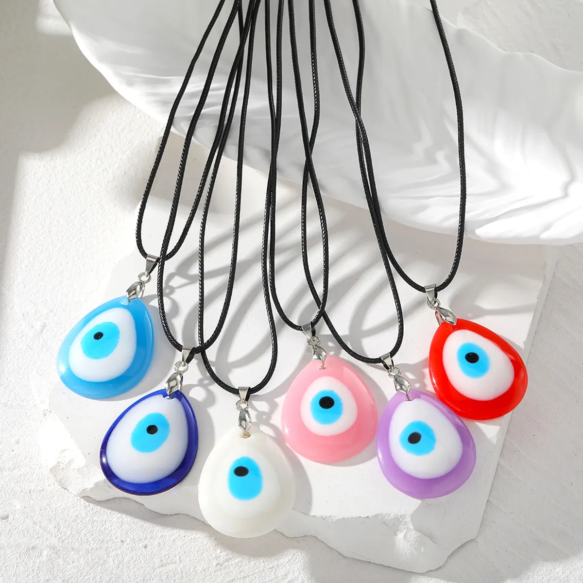 Women’s unique necklaces-Retro Simple Style Devil's Eye Water Droplets Resin Leather Rope Women's Pendant Necklace