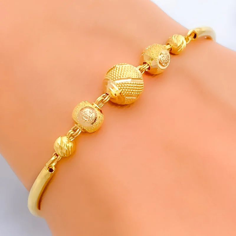 Women’s birthstone bangles-Elegant Sparkling 22k Gold Orb Flexi Bangle Bracelet