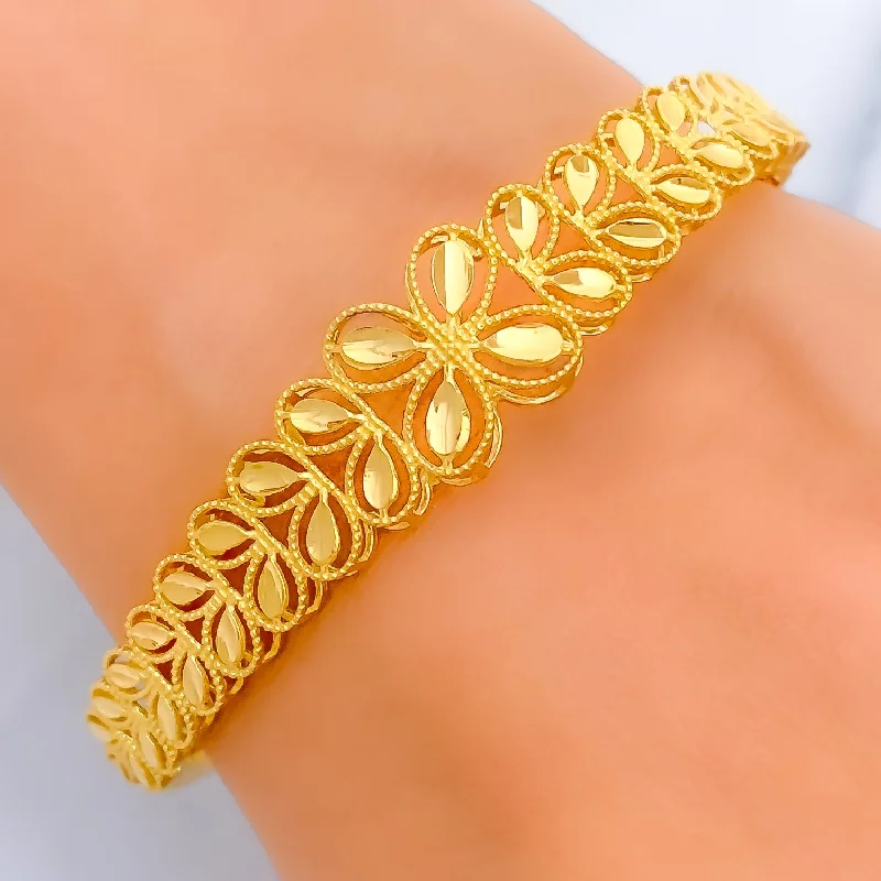 Women’s gemstone bracelets-Impeccable Graduating 22k Gold Floral Bangle Bracelet