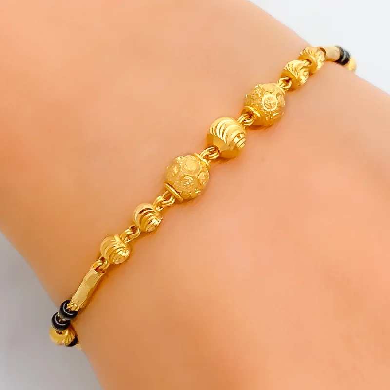 Women’s delicate gold bracelets-Regal Sophisticated 2k Gold Black Bead Bracelet