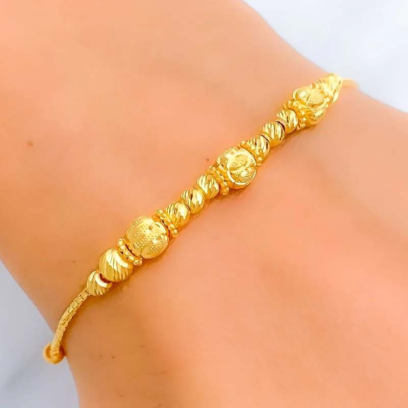 Women’s luxury bracelets-Captivating Striped Orb 22k Gold Bracelet