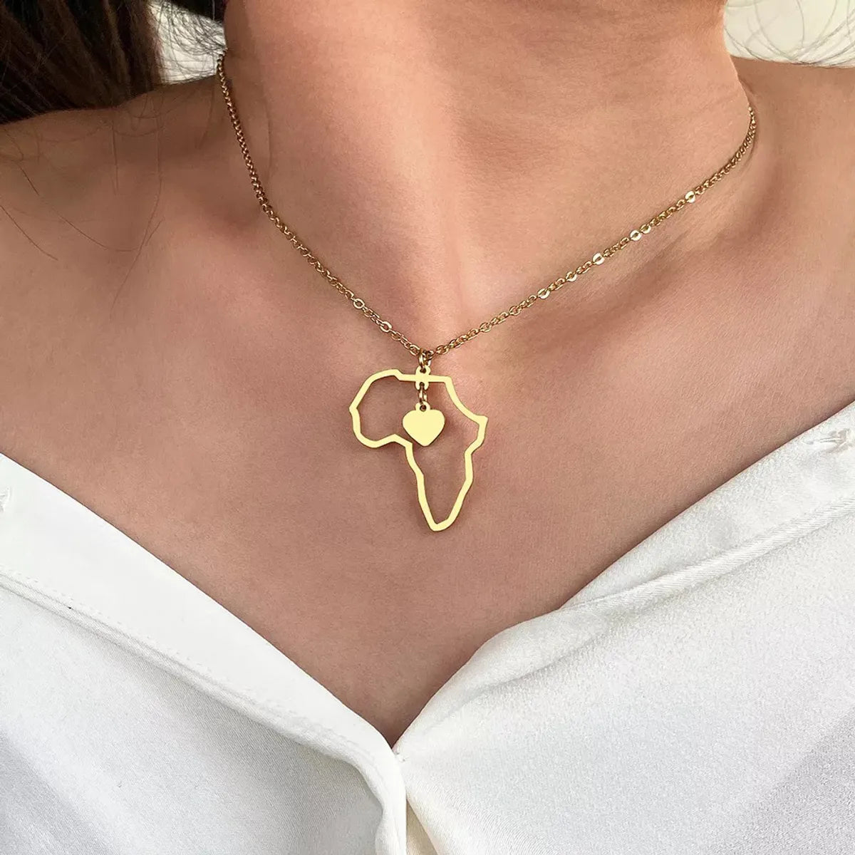 Women’s gold pendant necklaces-Stainless Steel Simple Style Streetwear Map Heart Shape Asymmetrical Hollow Out Pendant Necklace