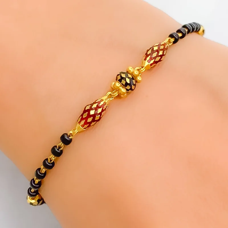 Women’s gold friendship bracelets-Radiant Polished 22k Gold Black Bead Bracelet